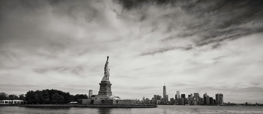 The Statue of Liberty against a city skyline